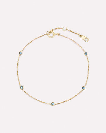 Solid Yellow Gold - Blue Topaz Birthstone Station Bracelet